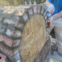 Stone Wall Construction — Natural stone wall construction on residential property.